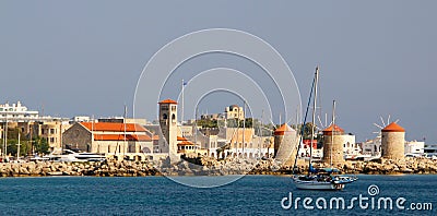 Rhodes, Mandraki harbour, view of the fortifications of the Old Town of Rhodes Editorial Stock Photo