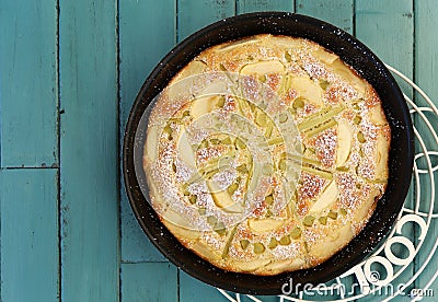 Rhubarb Apple Vanilla Cake in Baking Tray Turquoise Background Stock Photo