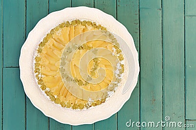 Rhubarb Apple Vanilla Cake on White Plate Turquoise Background Stock Photo