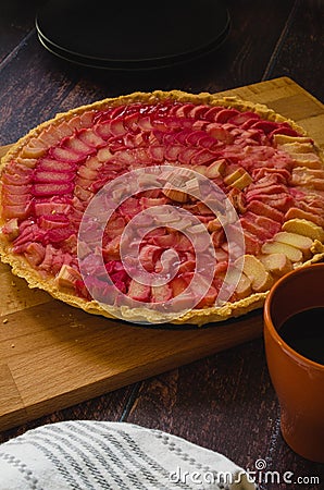 Rhubarb Ginger Custard Pie on the Wooden Board Stock Photo