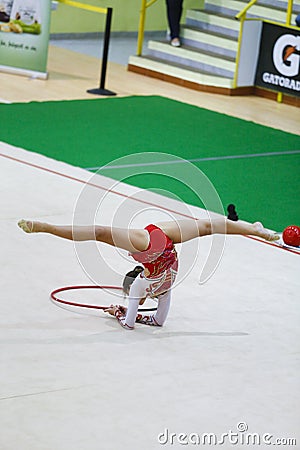 Athlete performing her hoop routine Stock Photo