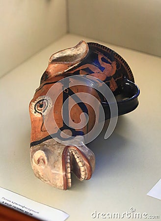 Hermitage. Ceramic red-figure rhyton in the form of a mule`s head. Ancient Greece Editorial Stock Photo