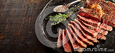 Rib eye steak served on plate Stock Photo