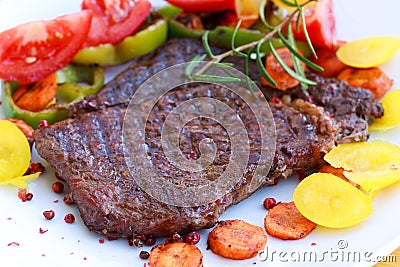 Rib Eye Steak with tomato,yellow bell peper Stock Photo