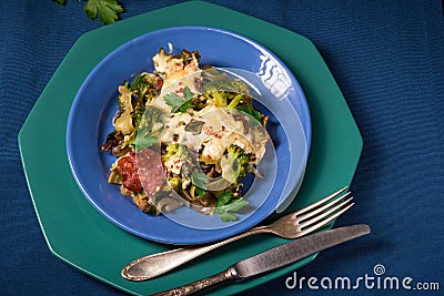 Ribbon pasta Casserole with chorizo and vegetables Stock Photo