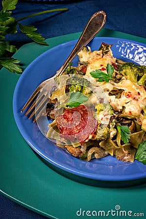 Ribbon pasta Casserole with chorizo and vegetables Stock Photo