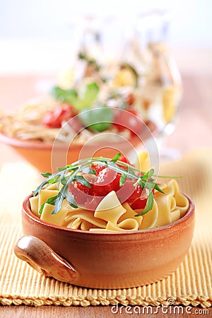 Ribbon pasta and peeled tomato Stock Photo