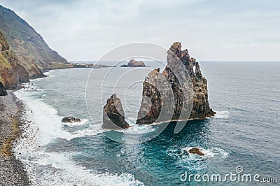 Ribeira da Janela famous Volcanic cliffs in the Atlantic view with ocean bay at the end of February, Madeira island, Portugal. Stock Photo