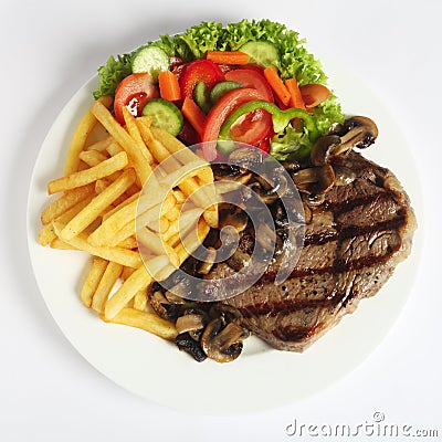 Ribeye steak dinner from above Stock Photo