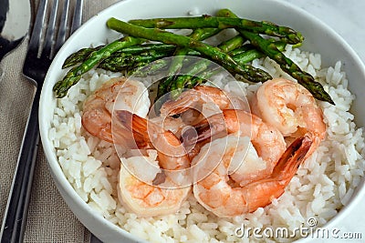 rice bowl top with shrimp and asparagus Stock Photo