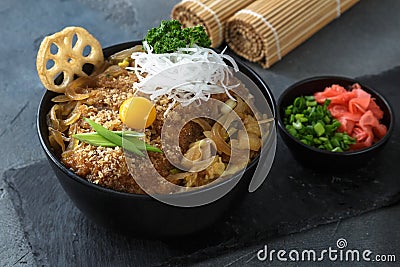 Rice bowl topped with fried pork cutlet Katsudon, tonkatsu donburi, japanese cuisine Stock Photo