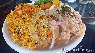 Rice of camaron and ceviche peruano Stock Photo
