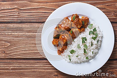 Rice with chicken in curry sauce top view Stock Photo