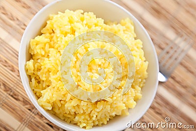 Rice cooked with kurkuma Stock Photo