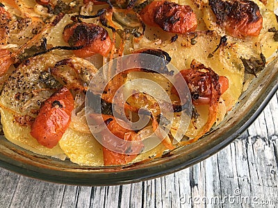 Rice potatoes and artichokes baked meal Stock Photo