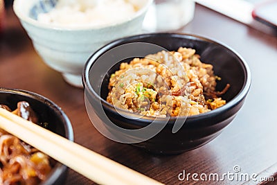 Rice stir fried with sukiyaki soup. Salty-sweet flavors from Shoyu sauce, Wagyu beef, pork and vegetables from sukiyaki hot pot Stock Photo