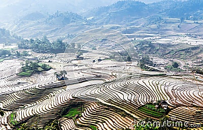 Rice terraces of the H'Mong ethnic people in Y Ty, Laocai, Vietnam at the water filling season (May 2015) Stock Photo