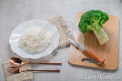 Rice and vegetable broccoli on white background healthy vegetarian food concept Stock Photo