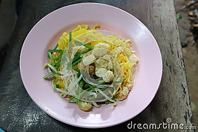 Rice Vermicelli mixed with seasonings and vegetables, local wisdom, Laplae province, Uttaradit Province, Thailand, called Mee Kud Stock Photo