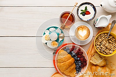 Rich breakfast menu on wooden table, copy space Stock Photo