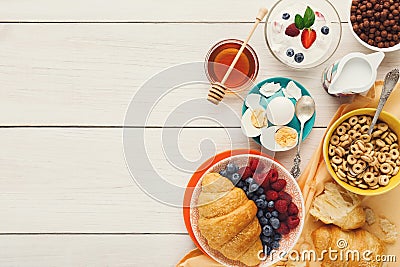 Rich breakfast menu on wooden table, copy space Stock Photo