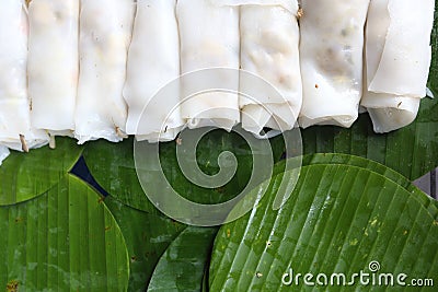 Rich noodle paste with bean sprout on Banana leaf with oil and galic, copy space for text and logo, urban food in asian, Stock Photo