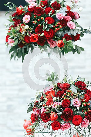 Rich red bouquets of roses, peonies and ranunculus Stock Photo
