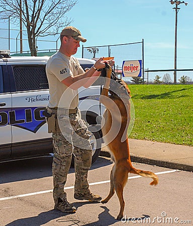 Richmond, KY US - March 31, 2018 - Easter Eggstravaganza A K9 Officer demonstrates canine techniques and training exercises Editorial Stock Photo