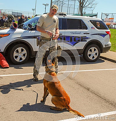 Richmond, KY US - March 31, 2018 - Easter Eggstravaganza A K9 Officer demonstrates canine techniques and training exercises Editorial Stock Photo