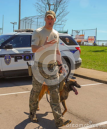 Richmond, KY US - March 31, 2018 - Easter Eggstravaganza A K9 Officer demonstrates canine techniques and training exercises Editorial Stock Photo