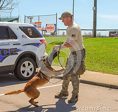 Richmond, KY US - March 31, 2018- Easter Eggstravaganza - A K9 Officer with Richmond Police Department demonstrates K9 techniques Editorial Stock Photo