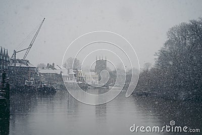 All Saints Isleworth Church view on snowy Sunday morning Editorial Stock Photo