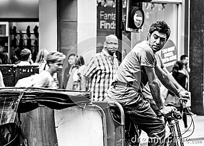 Rickshaw Rider on London Street Editorial Stock Photo