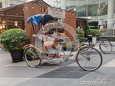 Rickshaw in front of a floating market mock up Editorial Stock Photo