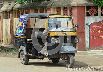 Rickshaw three-weeler tuk-tuk on the street in Kolkata Editorial Stock Photo