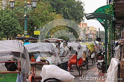 Rickshaws on Malioboro street in Yogyakarta, Java, Indonesia Editorial Stock Photo