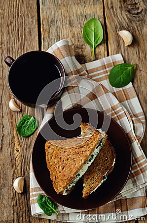 Ricotta spinach rye sandwich Stock Photo