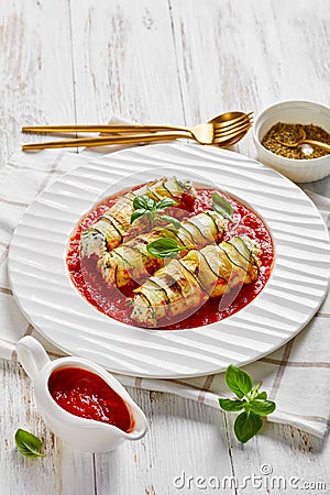 Ricotta and spinach stuffed zucchini on a plate Stock Photo