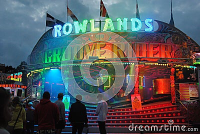 Ride at a funfair. Night time in Penzance Cornwall Editorial Stock Photo