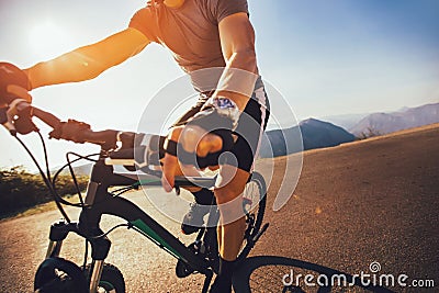 Rider`s hand on a mountain bike handlebars Stock Photo