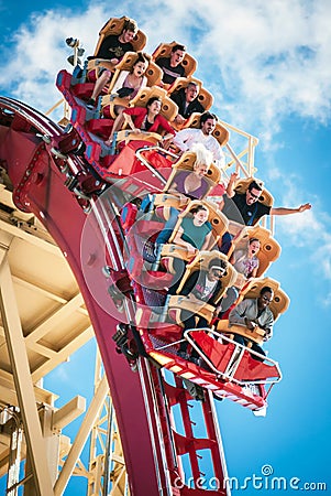 Riders enjoy the Rip Ride Rockit Roller Coaster Editorial Stock Photo