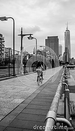 Riding bike towards One World Trade Center Freedom Editorial Stock Photo