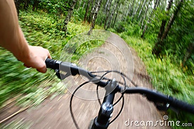 Riding mountain bike Stock Photo