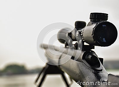 Rifle with a scope and bipod Stock Photo