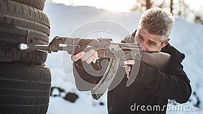 Rifle tactical shooting training behind and around cover or barricade Stock Photo