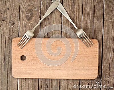 Rifled board and old forks Stock Photo