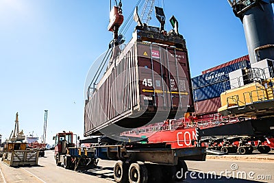 Riga, Latvia - April 20, 2022: Baltic Container Terminal in Freeport of Riga. Riga harbour, Latvia. Container ships in a Editorial Stock Photo