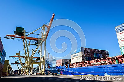 Riga, Latvia - April 20, 2022: Baltic Container Terminal in Freeport of Riga. Riga harbour, Latvia. Container ships in a Editorial Stock Photo