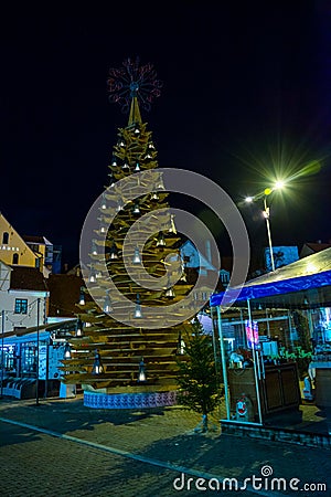 RIGA, LATVIA: Christmas decoration in night city. Christmas trees, garlands, installations, lights Editorial Stock Photo