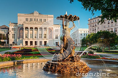Riga, Latvia. Fountain Nymph In Water Splashes In Aspazijas Boulevard Near National Opera Editorial Stock Photo